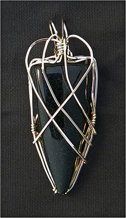 Cabachon by Kay Nitta: speckled black glass