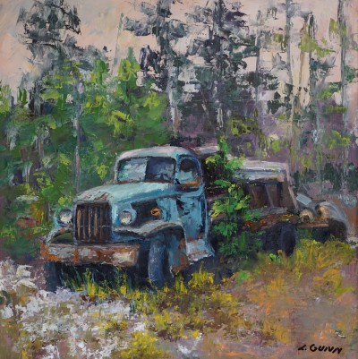 Old dliapidated blue truck